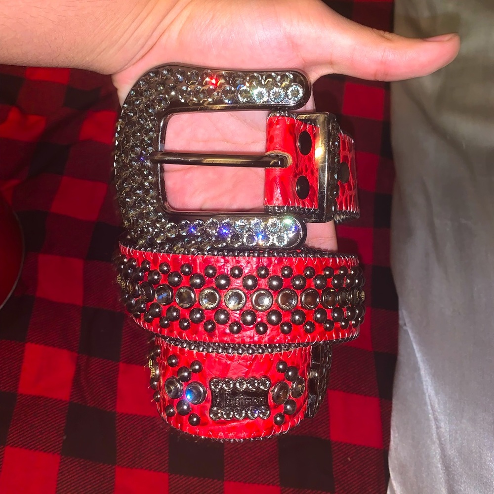 Bb Simon belt lavasan-red snake size 34,it has some scratchers on the buckle